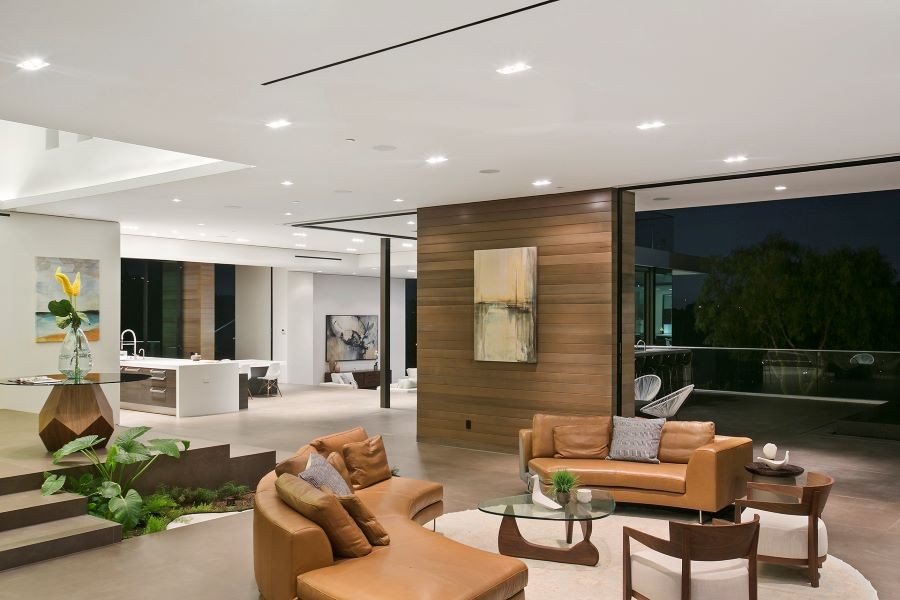 Home with an open floor plan and in-ceiling speakers and lights.