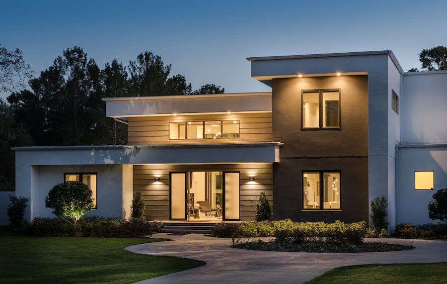 A house with outdoor lighting.